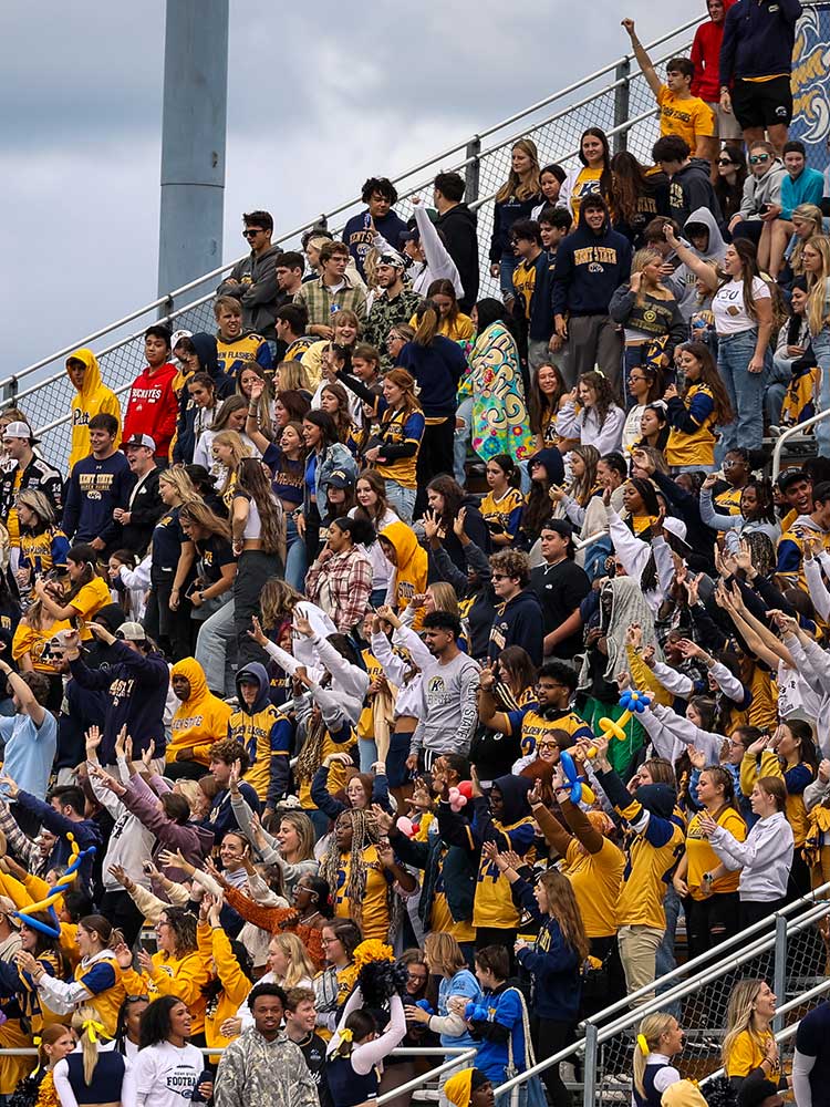 Fans cheering on the Golden Flashes