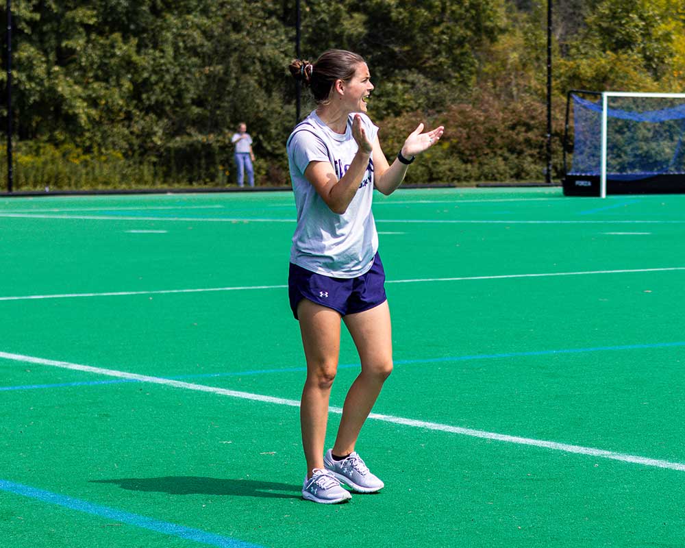 Coach cheers on team