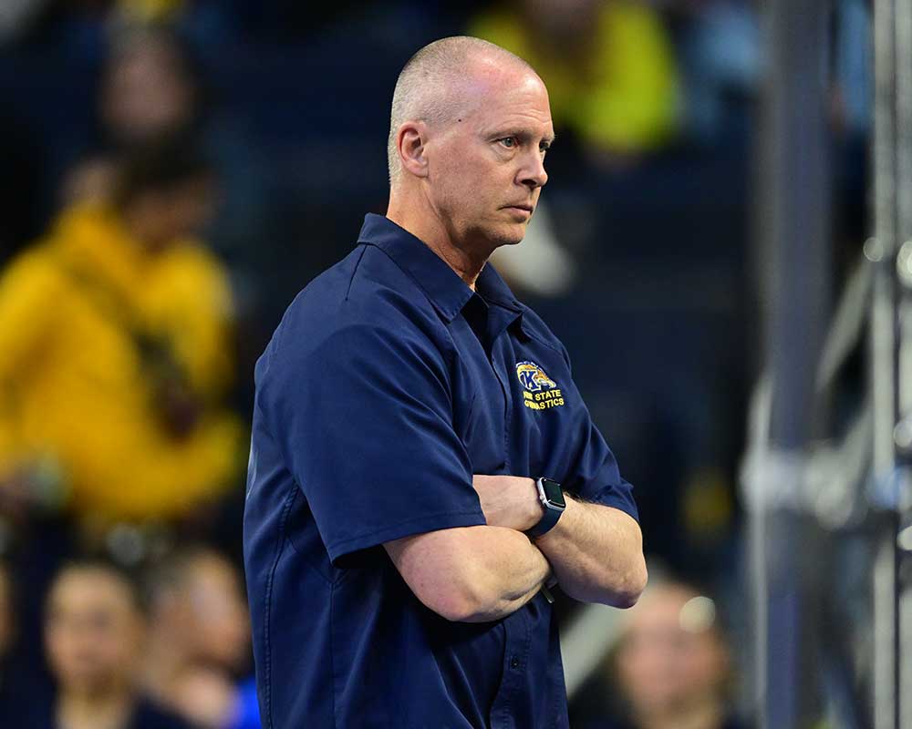 Coach watching competition