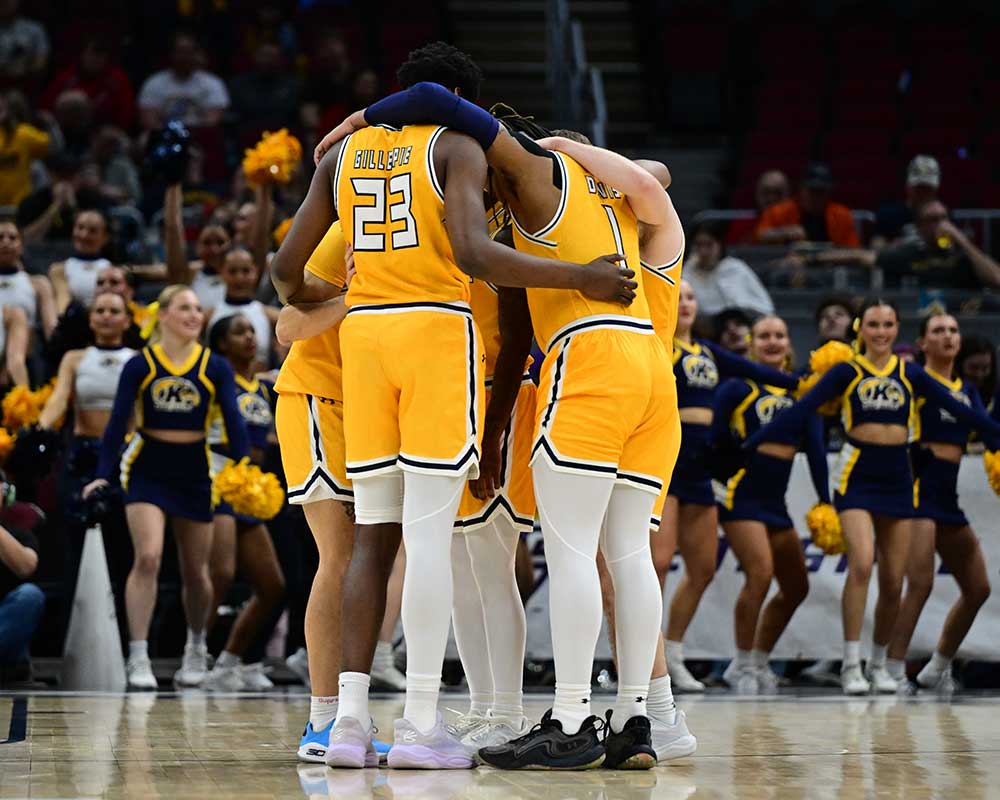 Basketball players huddle