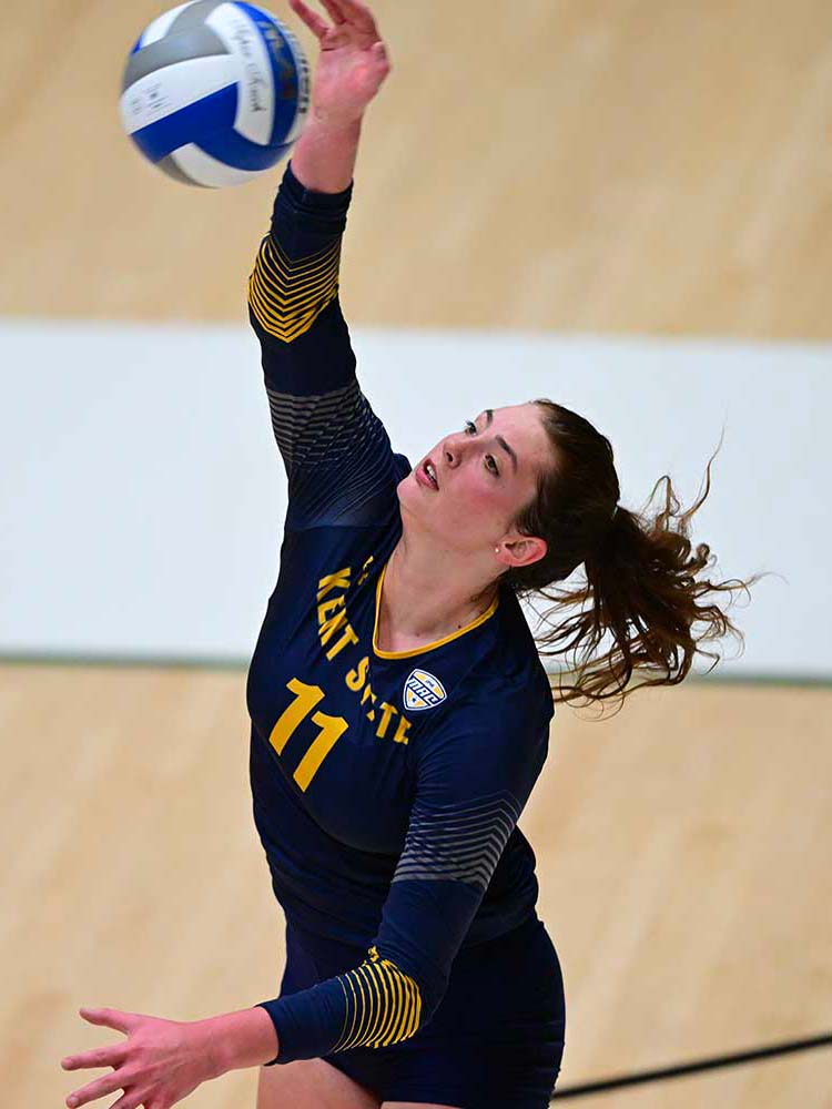 volleyball player hitting ball